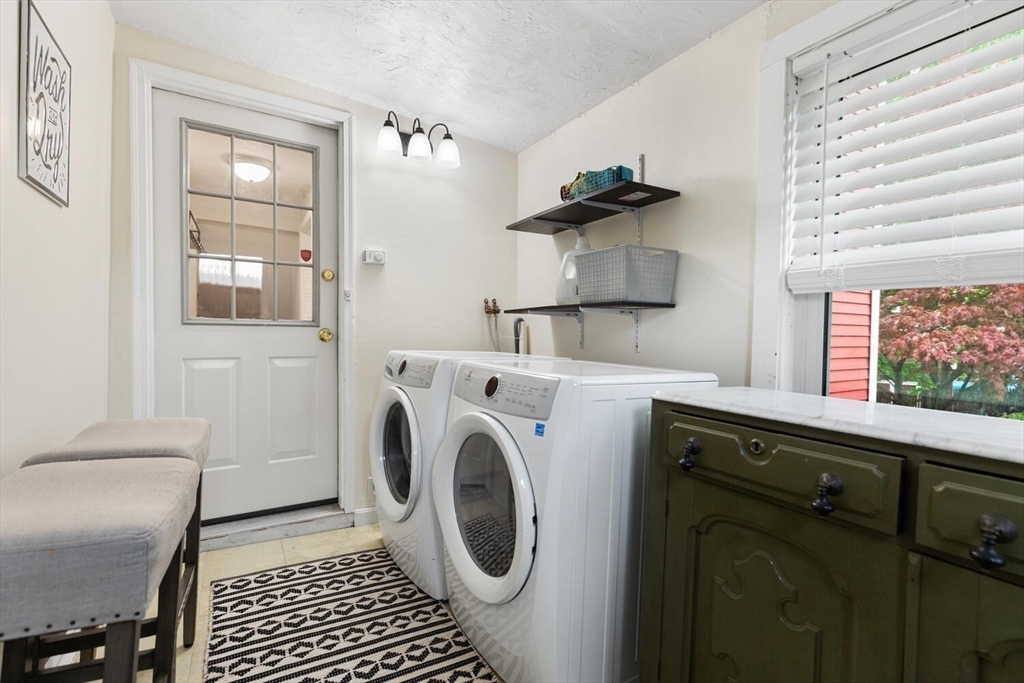 12 Wright Street, Unit 2 Stoneham, MA 02180 - Photo 23 of 35 a utility room with dryer and washer