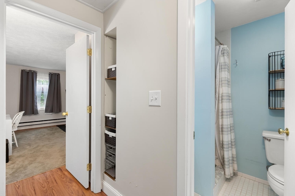 12 Wright Street, Unit 2 Stoneham, MA 02180 - Photo 28 of 35 a bathroom with a toilet and a shower
