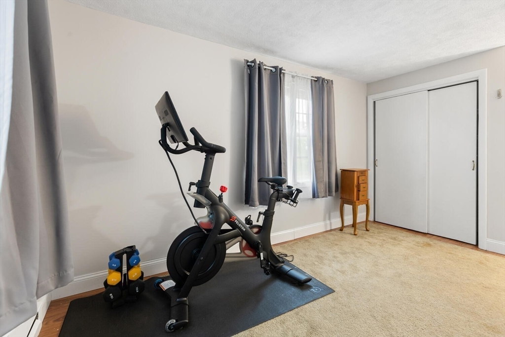 12 Wright Street, Unit 2 Stoneham, MA 02180 - Photo 30 of 35 a view of a room with gym equipment