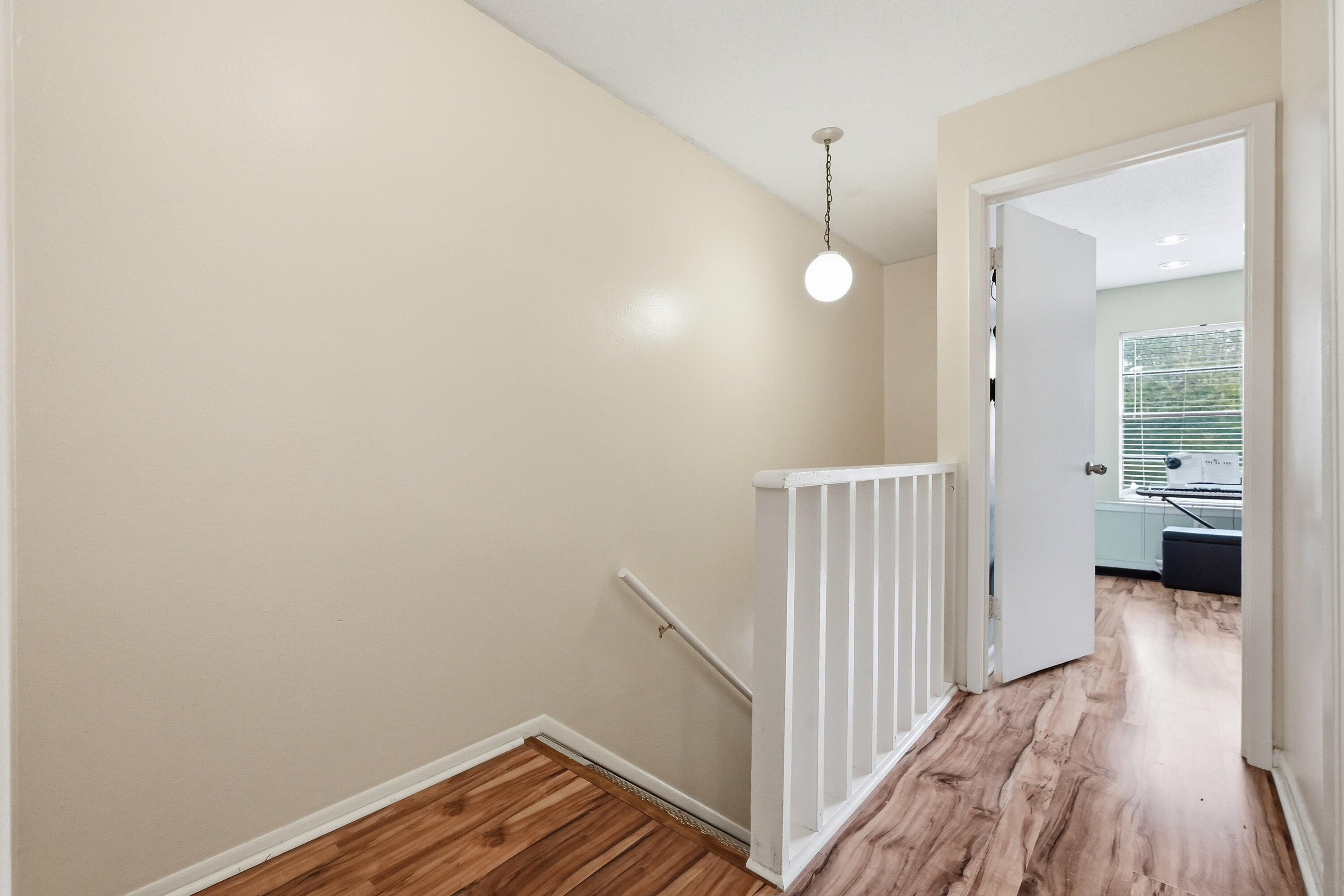 41 12th Street, Unit 68 Shalimar, FL 32579 - Photo 11 of 32 a view of a room with wooden floor and a bathroom