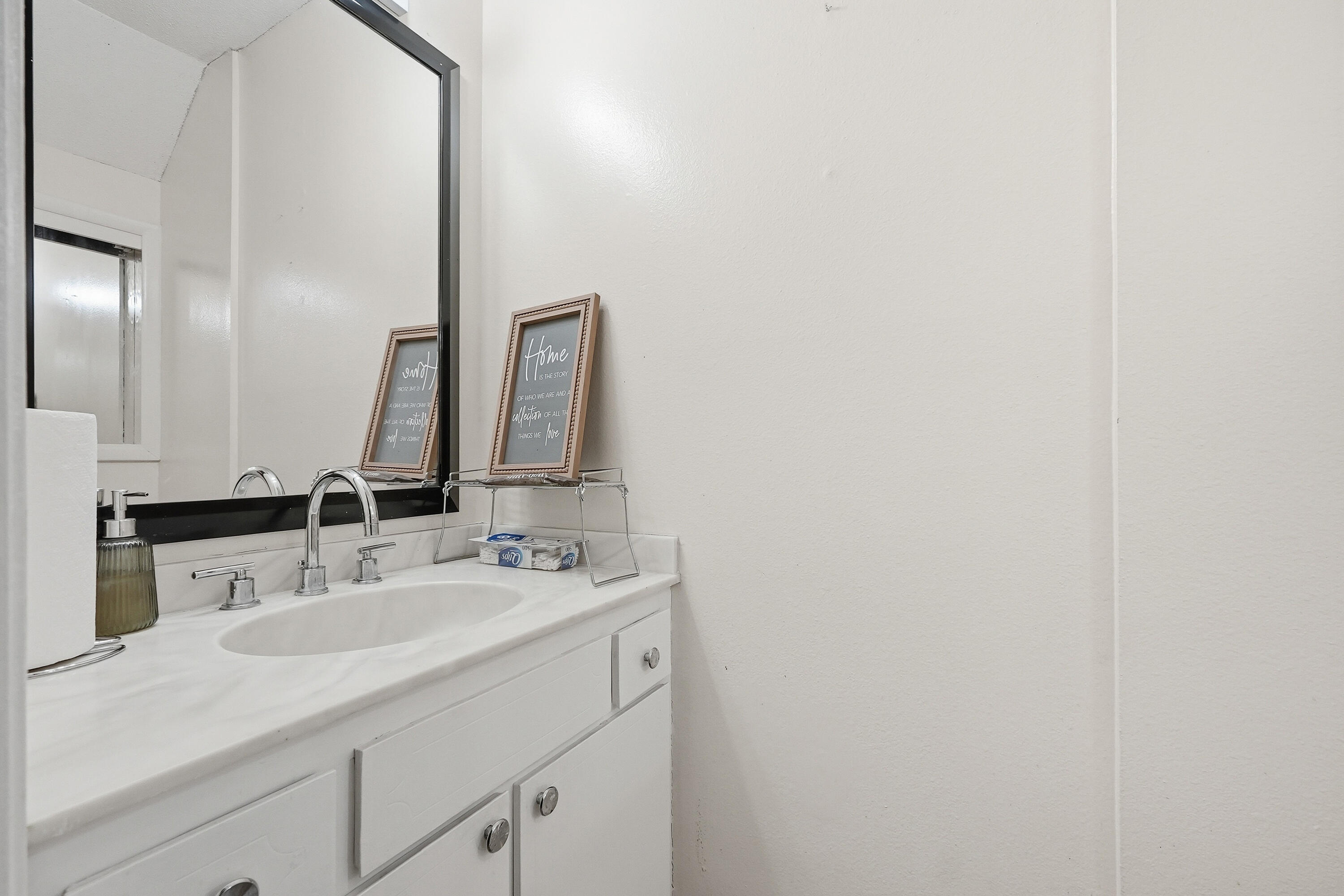 41 12th Street, Unit 68 Shalimar, FL 32579 - Photo 15 of 32 a bathroom with a sink and a mirror