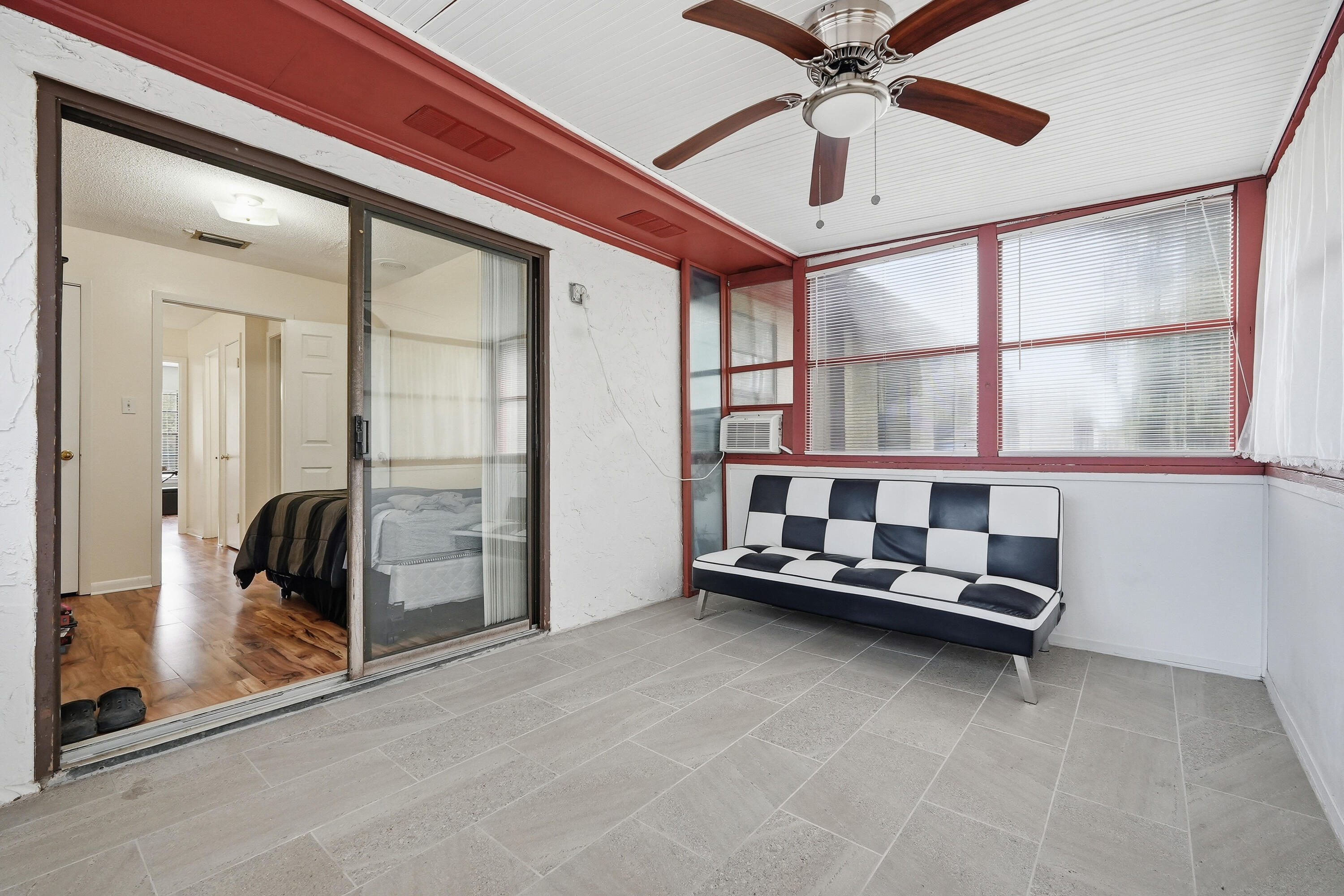 41 12th Street, Unit 68 Shalimar, FL 32579 - Photo 23 of 32 a living room with furniture and a large window
