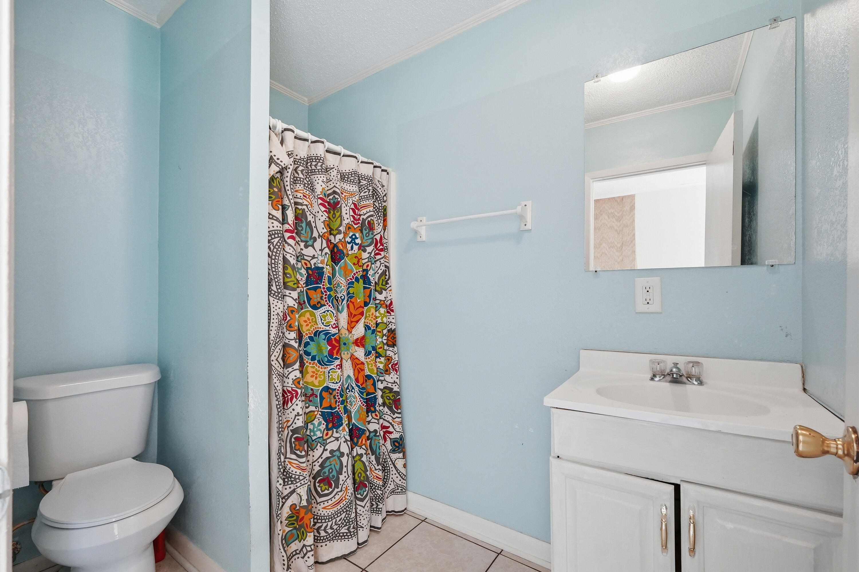 41 12th Street, Unit 68 Shalimar, FL 32579 - Photo 29 of 32 a bathroom with a sink and a toilet