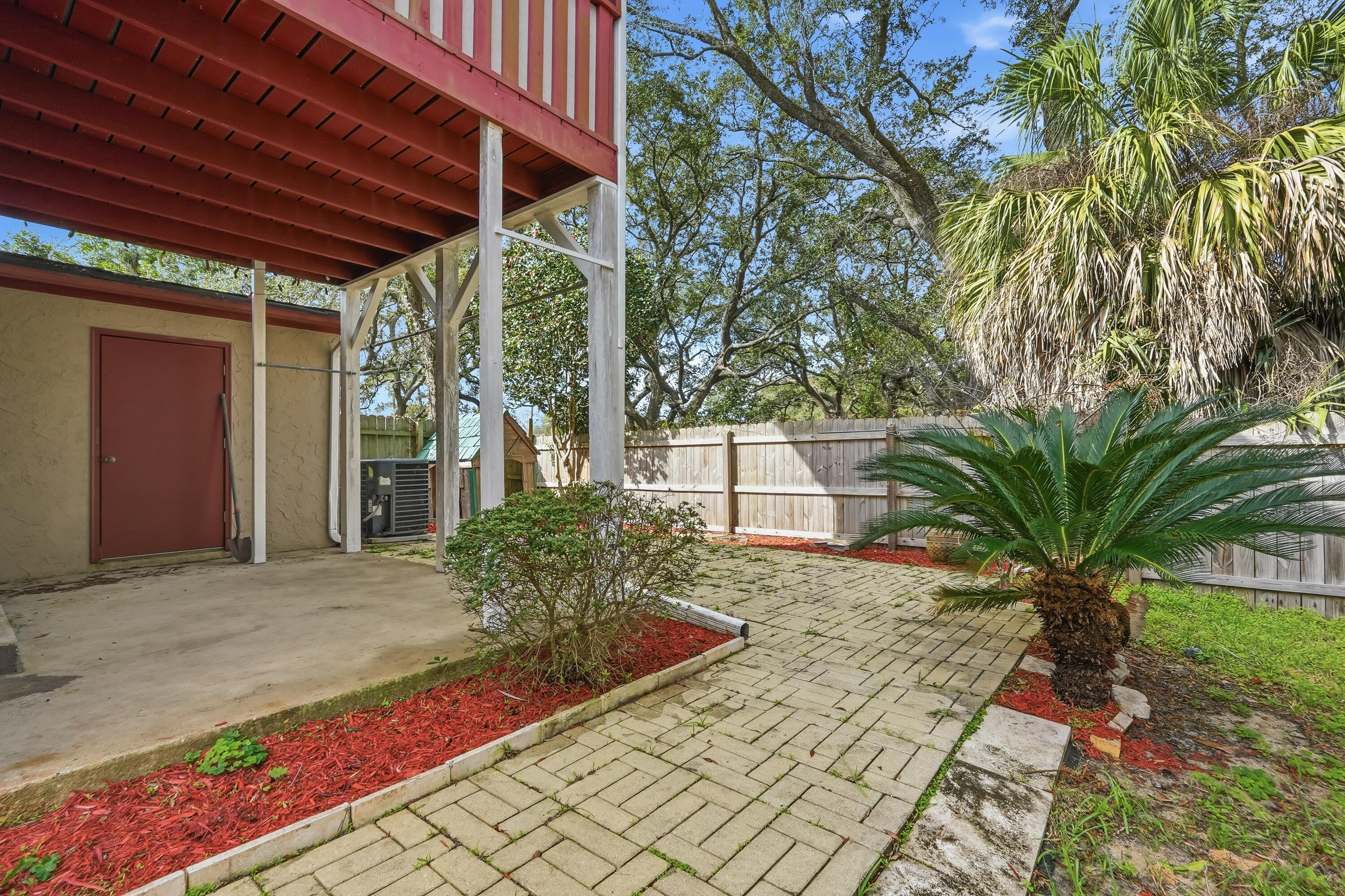 41 12th Street, Unit 68 Shalimar, FL 32579 - Photo 32 of 32 a view of a backyard