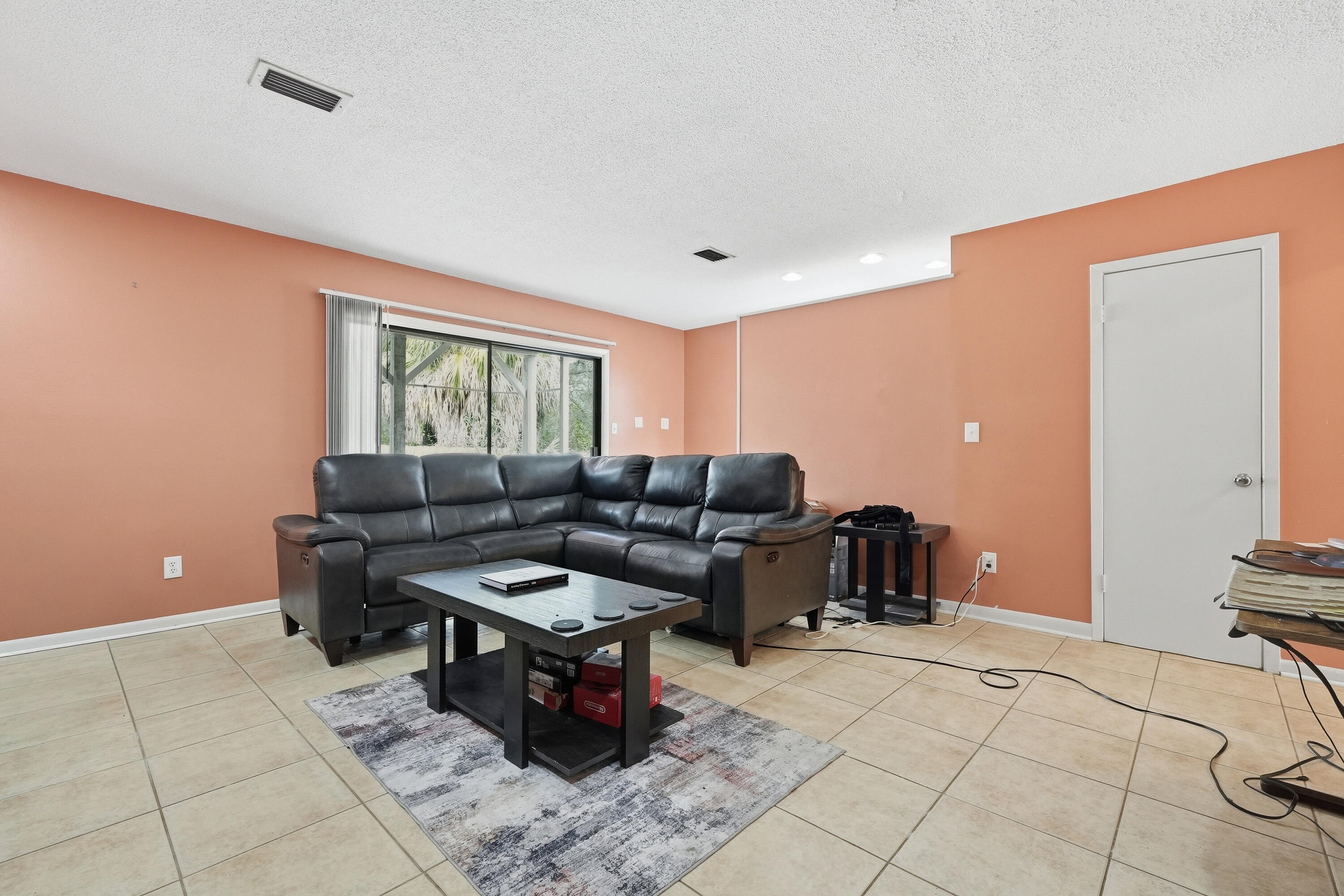 41 12th Street, Unit 68 Shalimar, FL 32579 - Photo 8 of 32 a living room with furniture and a window