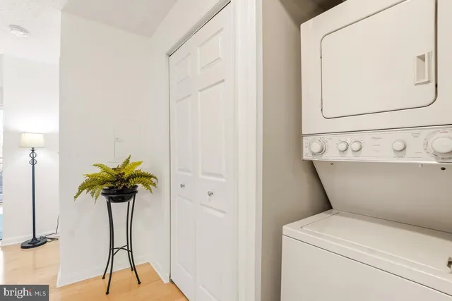 a close view of a utility room with washer and dryer