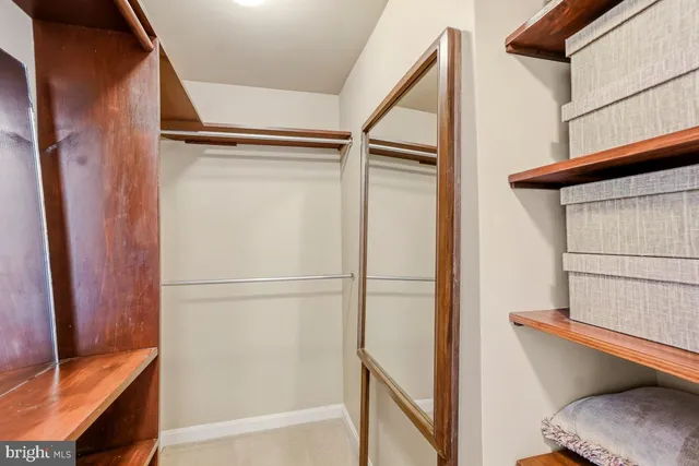 a bathroom with a shower and a sink