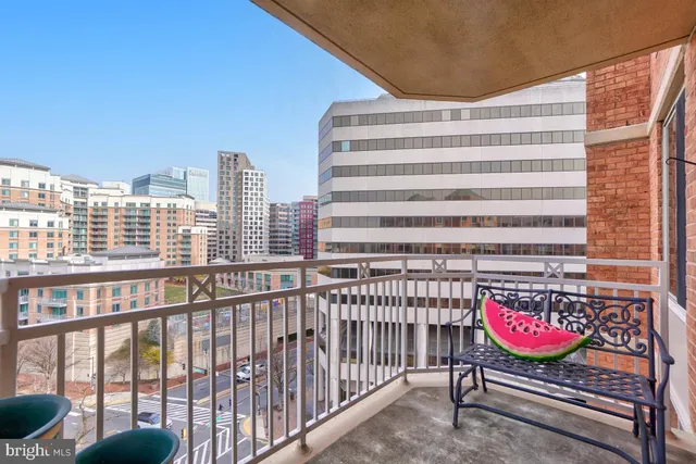 a view of a balcony with city view