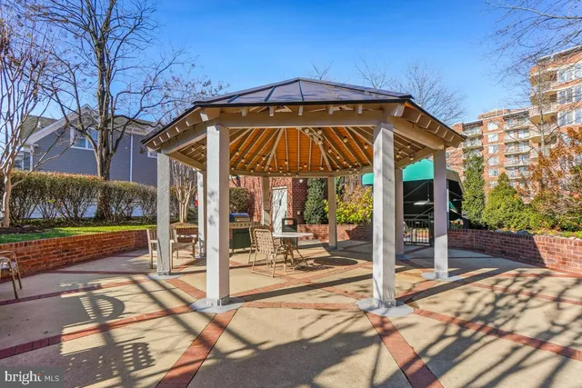a view of an chairs and table in the patio