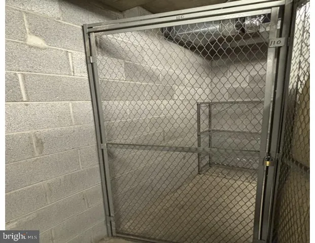 a bathroom with a glass door shower