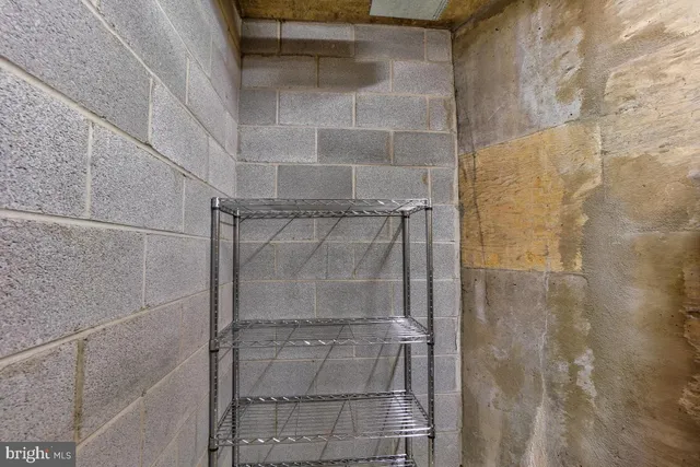 a view of parking garage with cars