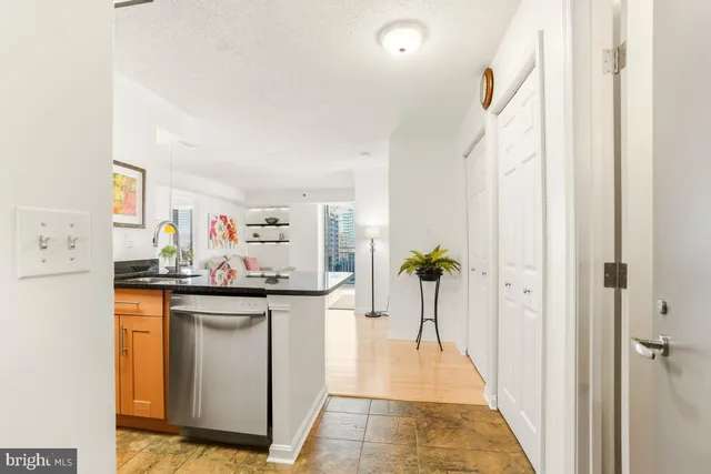 a view of a kitchen with appliances and a center island