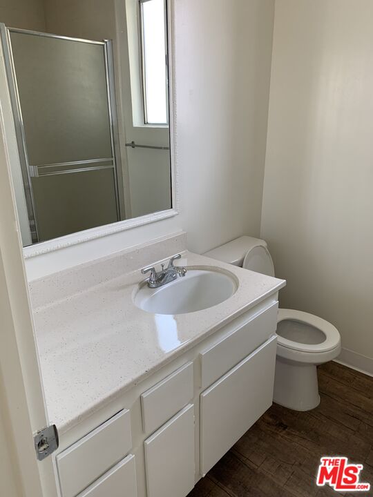 11525 Rochester Avenue, Unit 204 Los Angeles, CA 90025 - Photo 5 of 8 a bathroom with a sink and a toilet