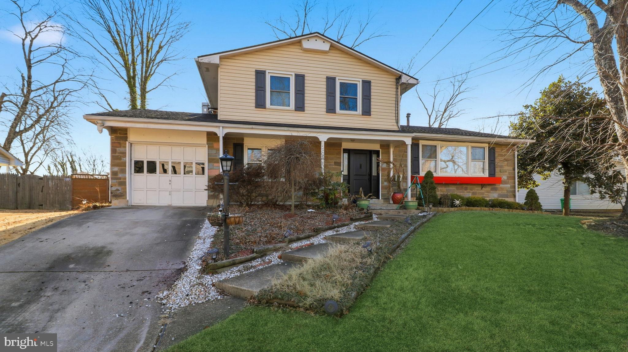 1703 Tioga Road Fort Washington, MD 20744 - Photo 2 of 57 Charming two-story home with lush landscaping.