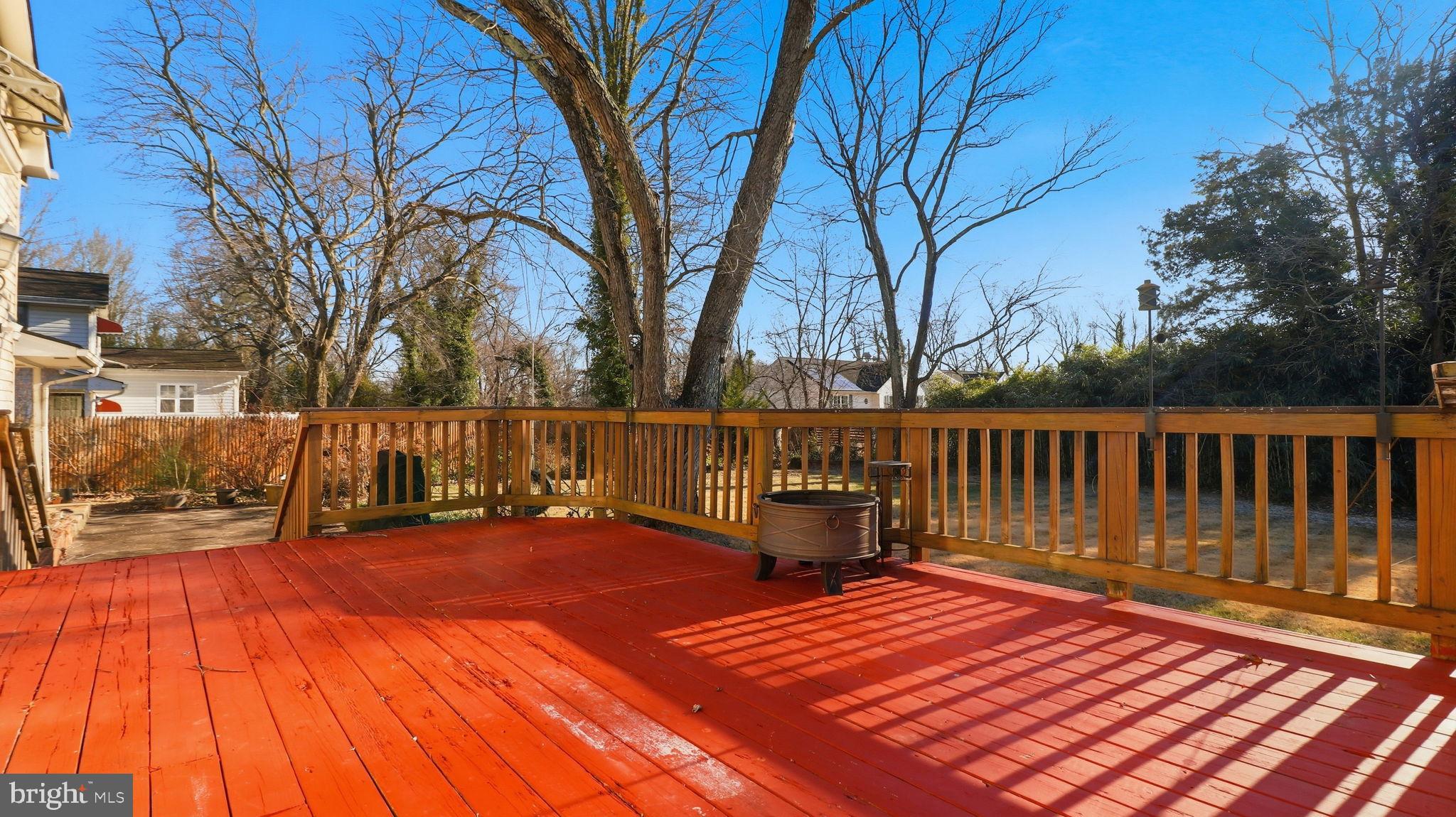 1703 Tioga Road Fort Washington, MD 20744 - Photo 22 of 57 Sunny deck with vibrant red flooring.