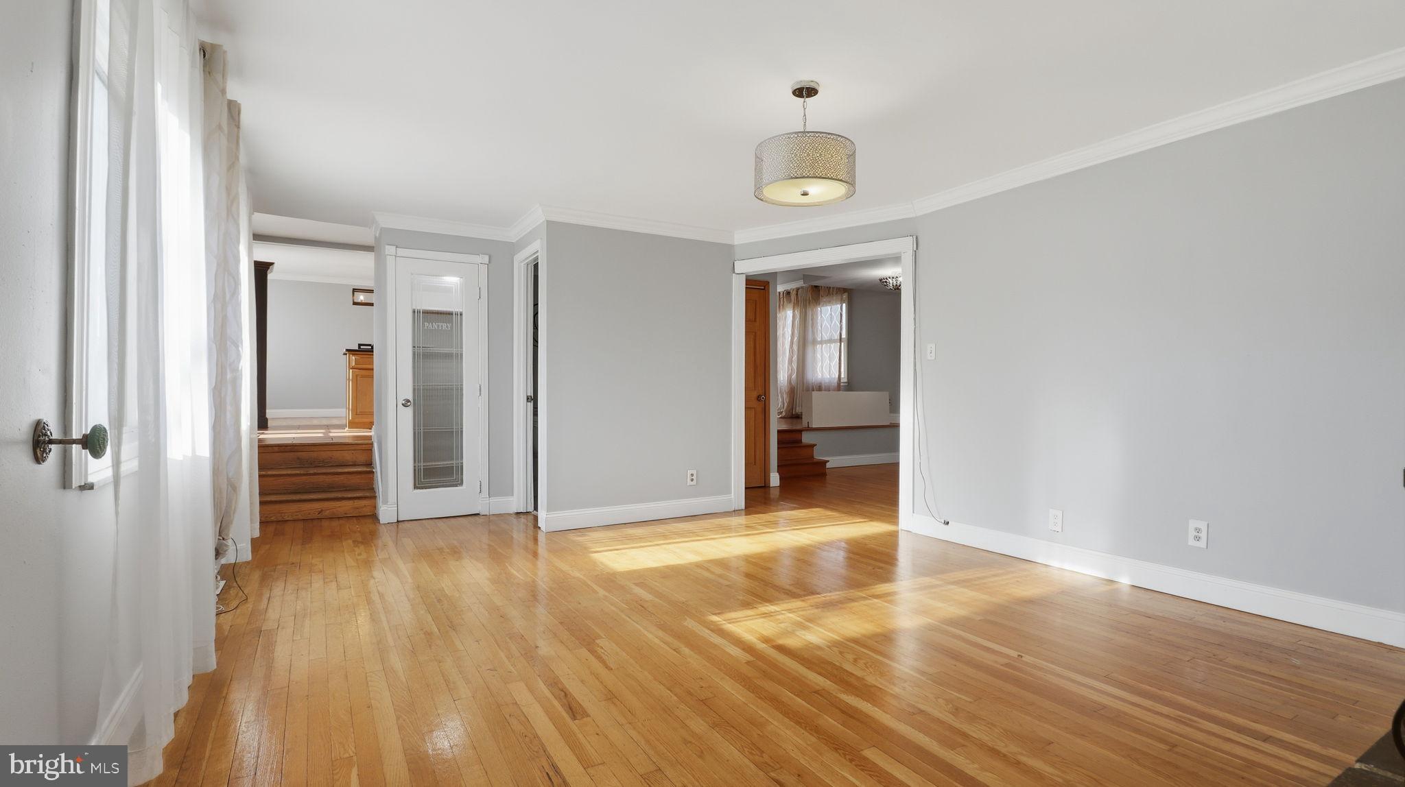1703 Tioga Road Fort Washington, MD 20744 - Photo 24 of 57 Bright and airy open space with hardwood floors.