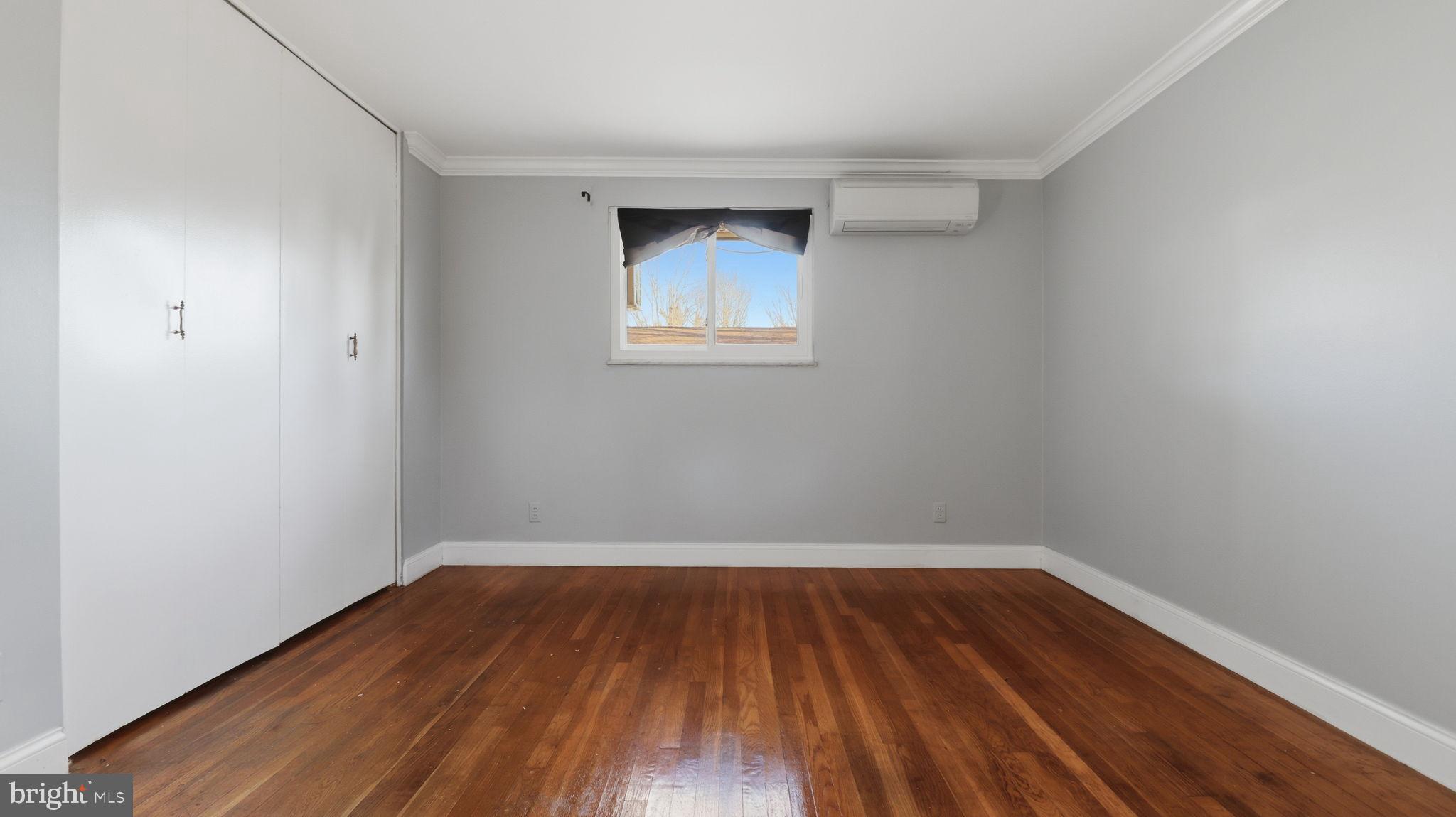 1703 Tioga Road Fort Washington, MD 20744 - Photo 34 of 57 Bright, airy room with polished floors.