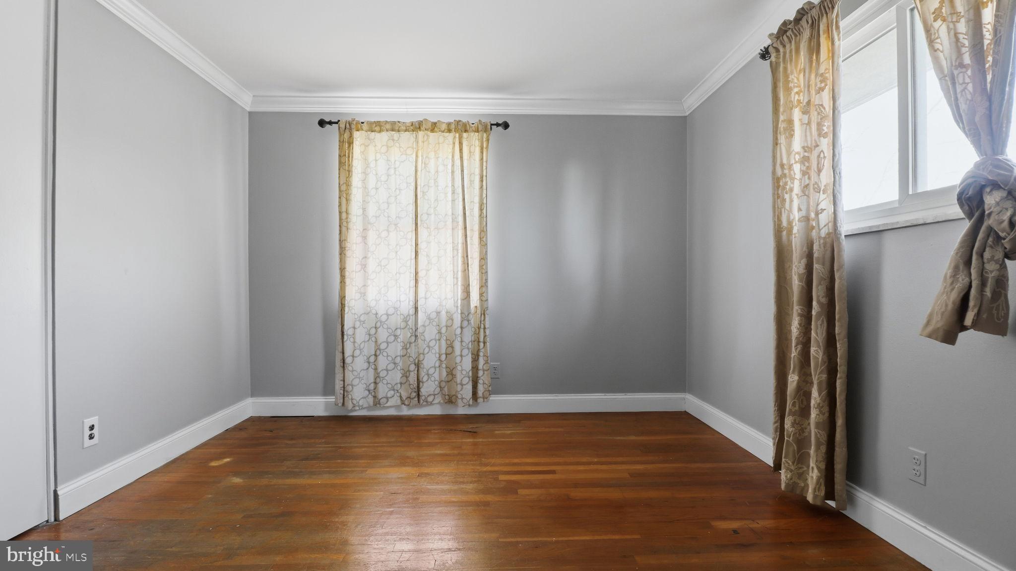 1703 Tioga Road Fort Washington, MD 20744 - Photo 37 of 57 Bright and airy room with elegant curtains.