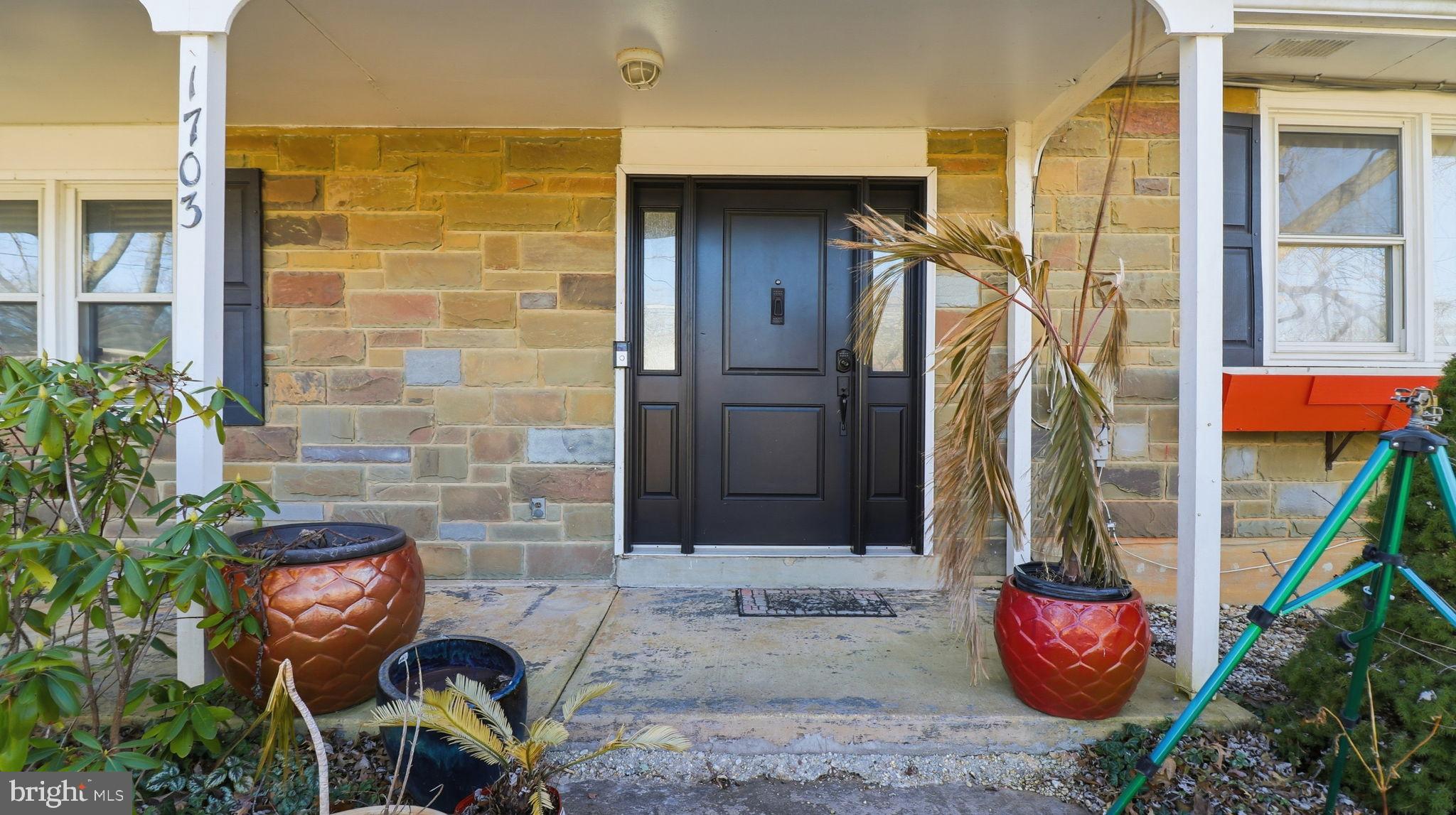 1703 Tioga Road Fort Washington, MD 20744 - Photo 4 of 57 Charming entryway with stone accents.
