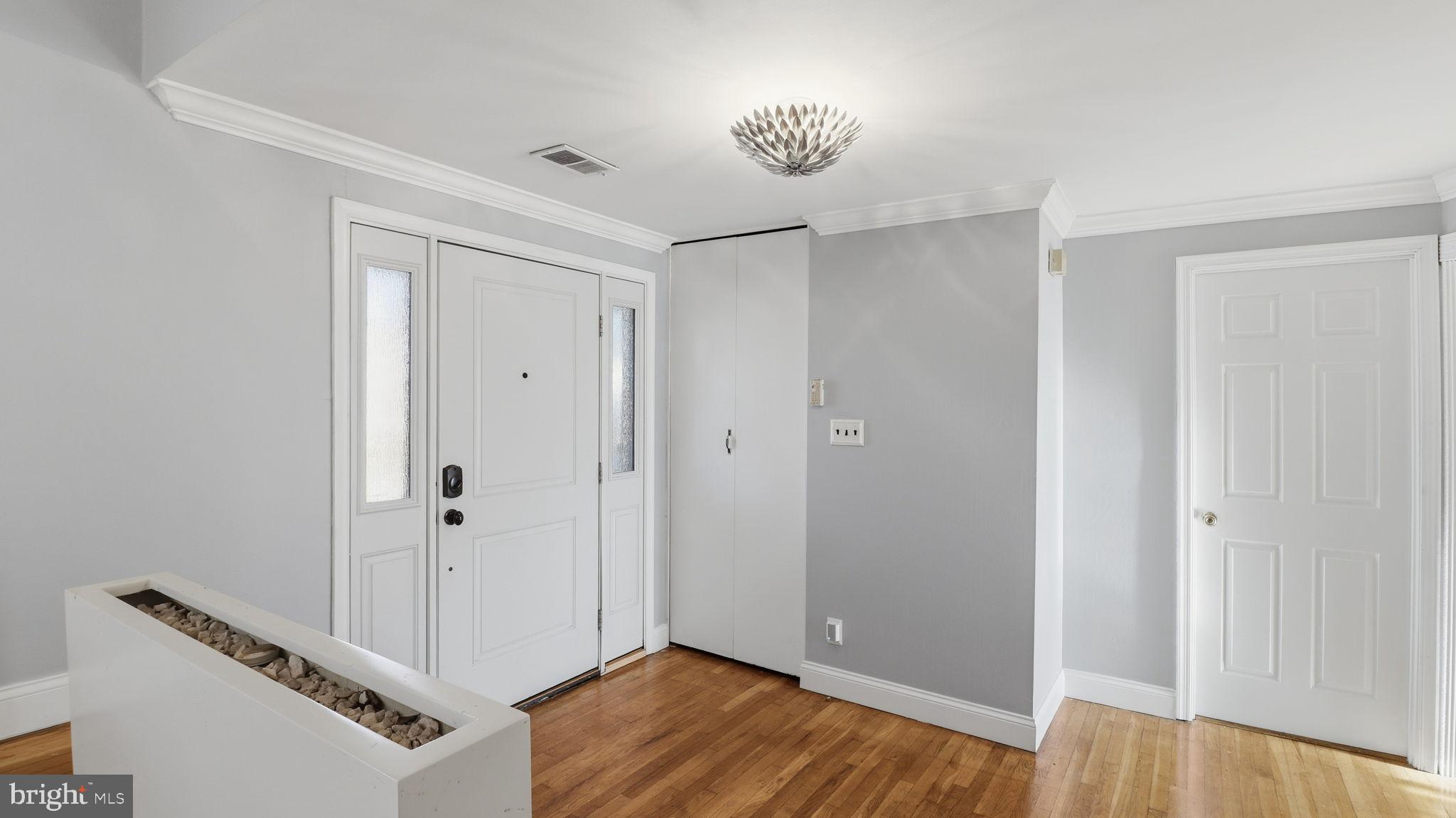 1703 Tioga Road Fort Washington, MD 20744 - Photo 5 of 57 Inviting entryway with modern elegance.
