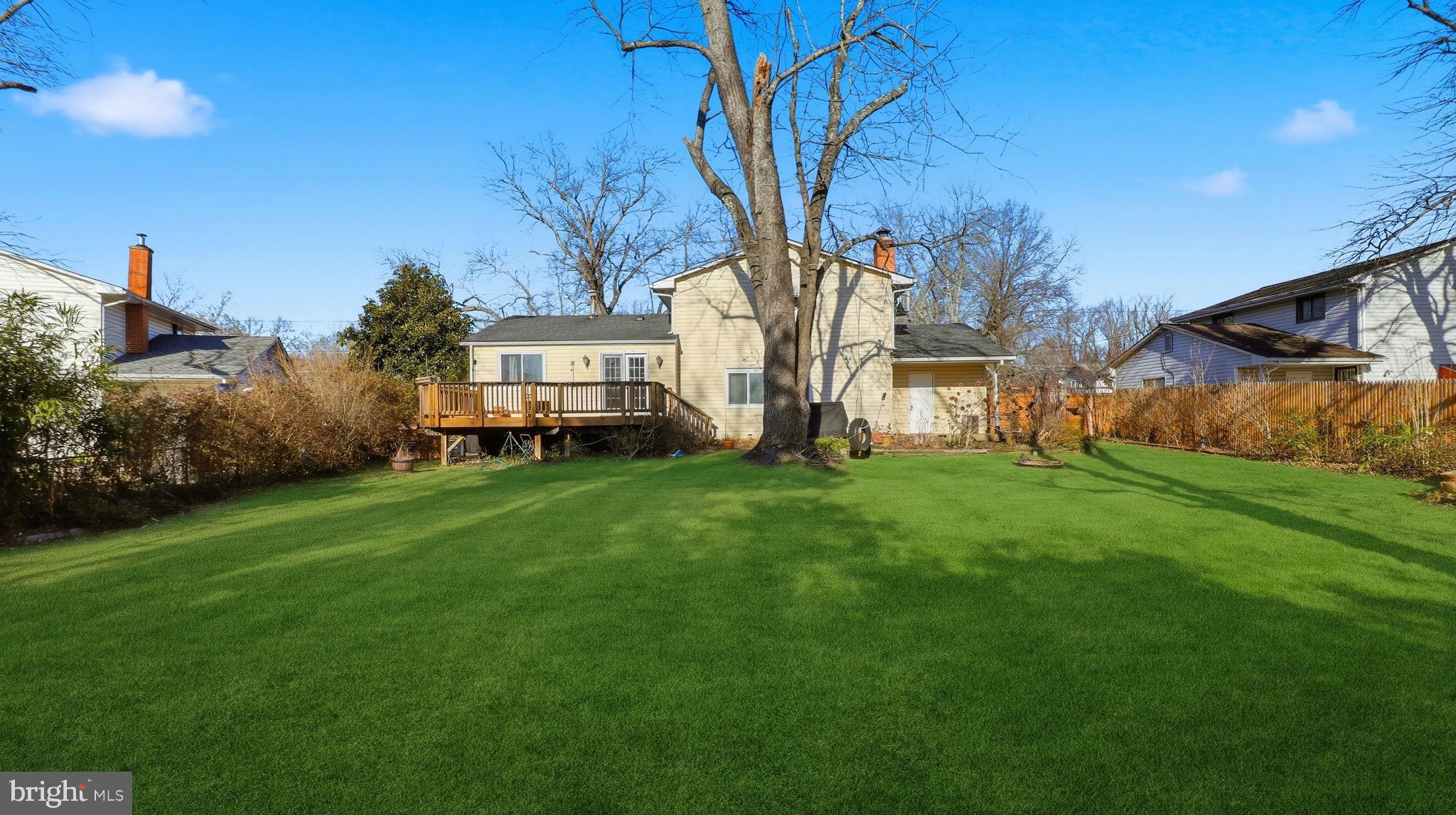 1703 Tioga Road Fort Washington, MD 20744 - Photo 56 of 57 Spacious backyard oasis with lush greenery.