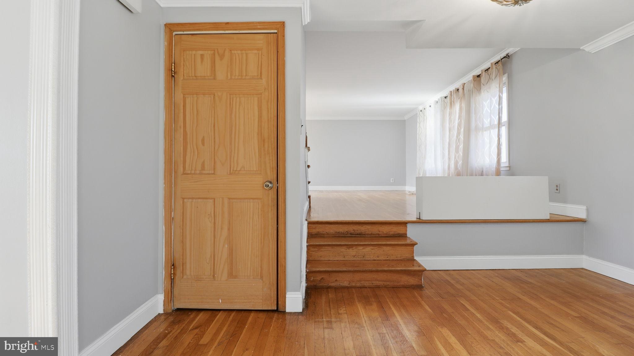 1703 Tioga Road Fort Washington, MD 20744 - Photo 7 of 57 Inviting entryway with warm wooden accents.