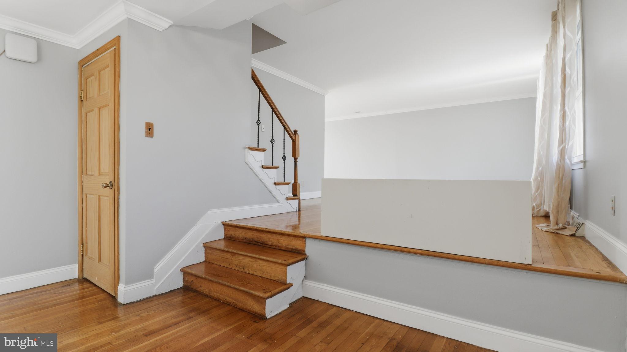 1703 Tioga Road Fort Washington, MD 20744 - Photo 9 of 57 Bright and airy entryway with wooden accents.