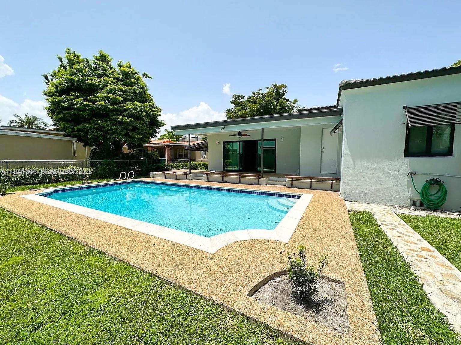 3050 Southwest 21st Street Miami, FL 33145 - Photo 12 of 38 a view of a house with swimming pool
