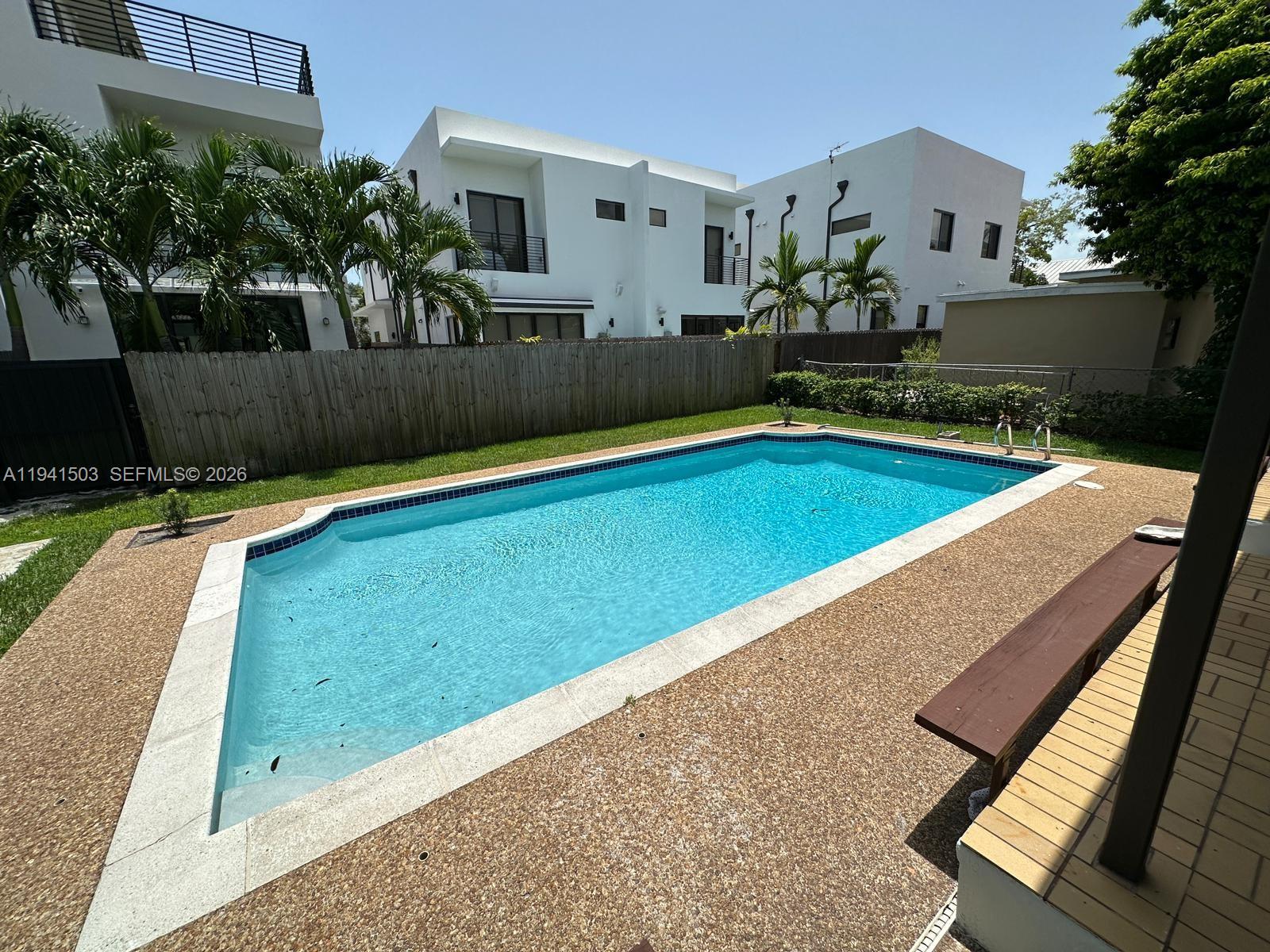 3050 Southwest 21st Street Miami, FL 33145 - Photo 15 of 38 a view of swimming pool with outdoor seating