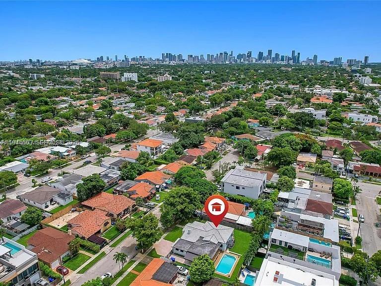 3050 Southwest 21st Street Miami, FL 33145 - Photo 7 of 38 an aerial view of residential houses with outdoor space