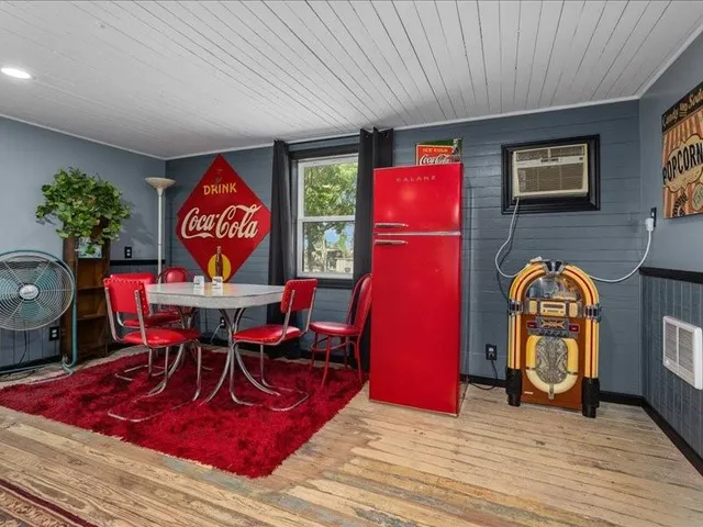 a view of a dining room with furniture