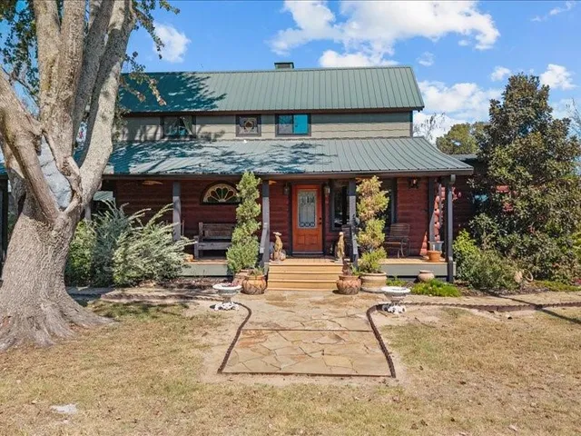 a view of a house with sitting area