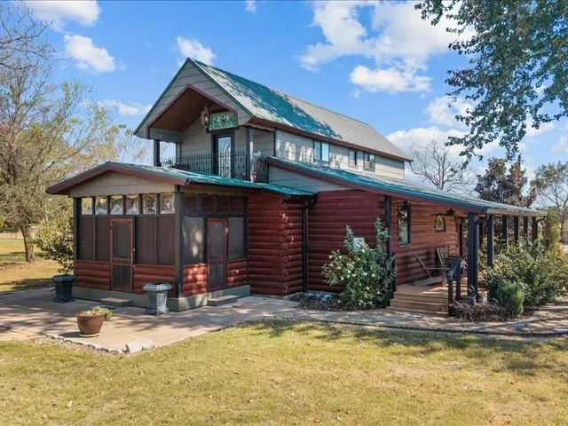 a front view of a house with swimming pool