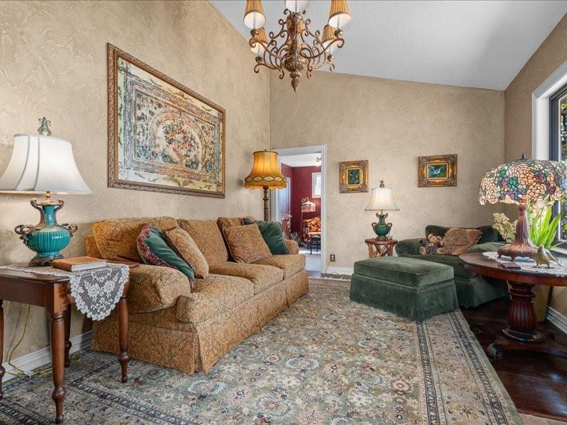 1847 Highway 19 Emory, TX 75440 - Photo 10 of 40 a living room with furniture a chandelier and a window