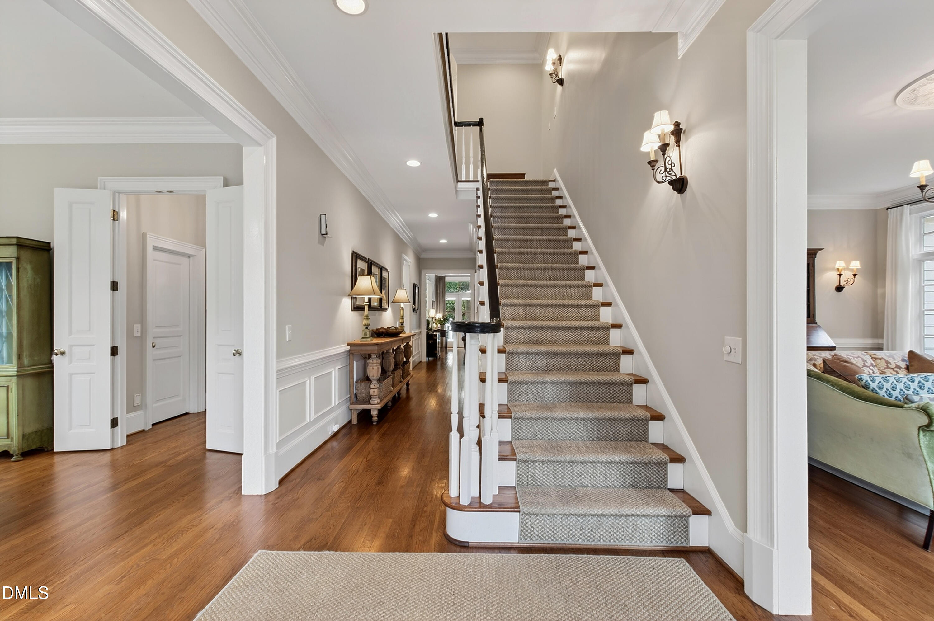 2536 Wake Drive Raleigh, NC 27608 - Photo 3 of 74 a view of entryway and hall with wooden floor