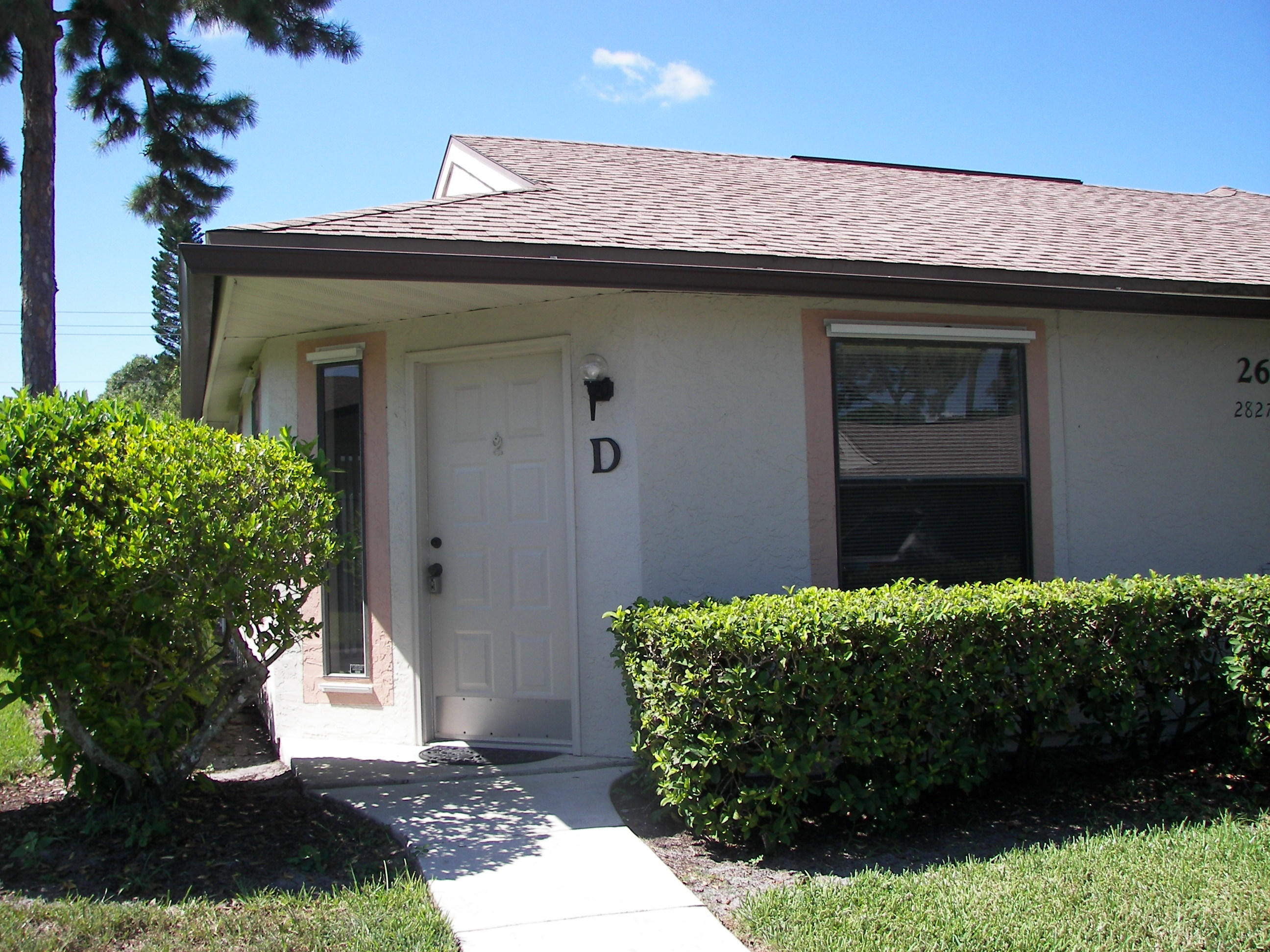 2827 Stoneway Lane, Unit D Fort Pierce, FL 34982 - Photo 1 of 25 a front view of a house