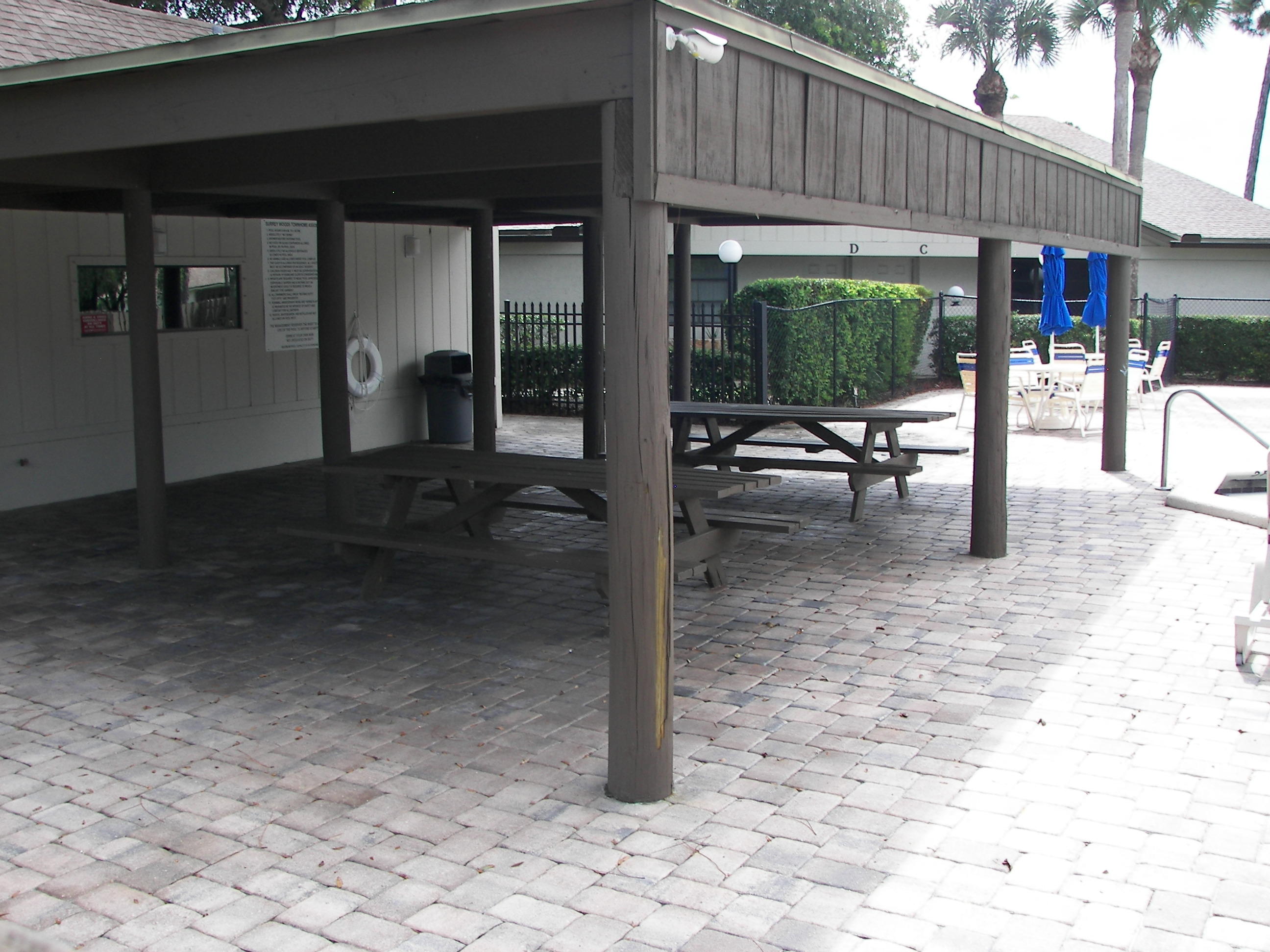 2827 Stoneway Lane, Unit D Fort Pierce, FL 34982 - Photo 22 of 25 a view of a dinning room with a patio