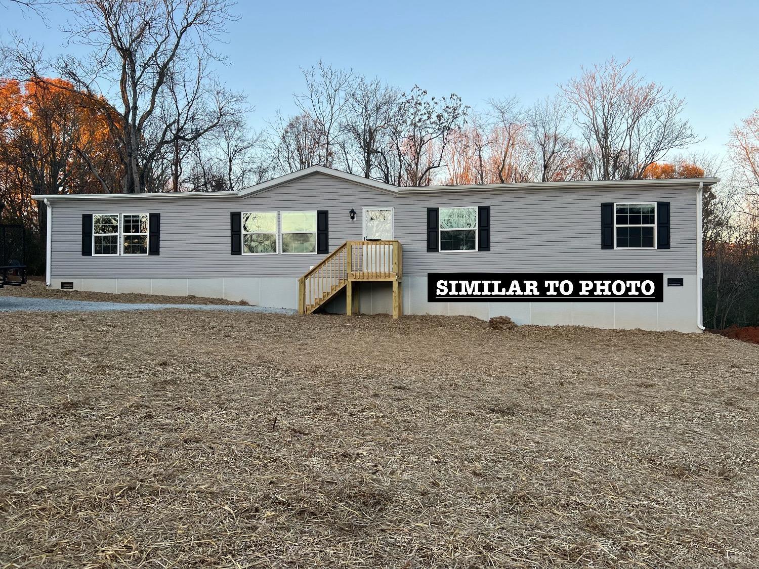 6 Deer View Road Gretna, VA 24557 - Photo 1 of 5 a view of a house with a yard