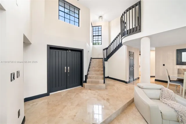 a view of an entryway with staircase