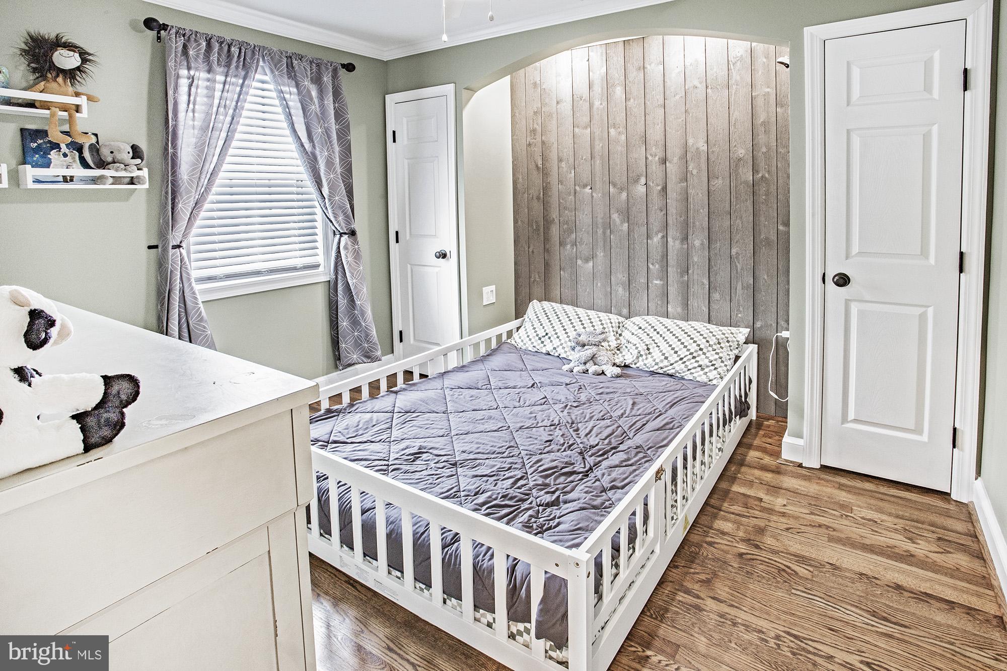 5000 Ogletown Stanton Road Newark, DE 19713 - Photo 11 of 39 a bedroom with a bed and a window