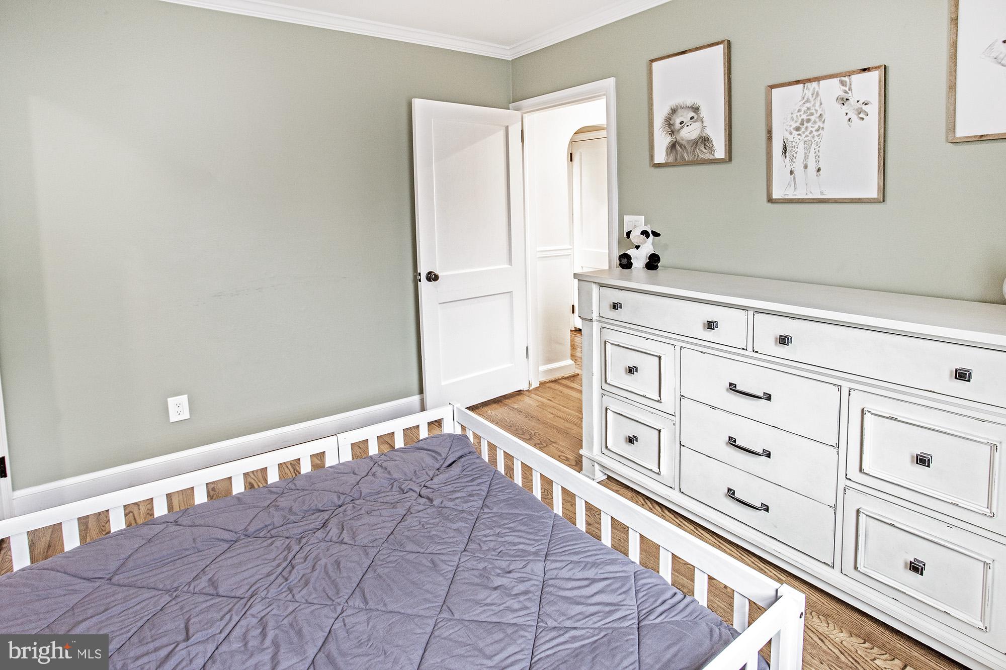 5000 Ogletown Stanton Road Newark, DE 19713 - Photo 12 of 39 a bedroom with a bed and a cabinets