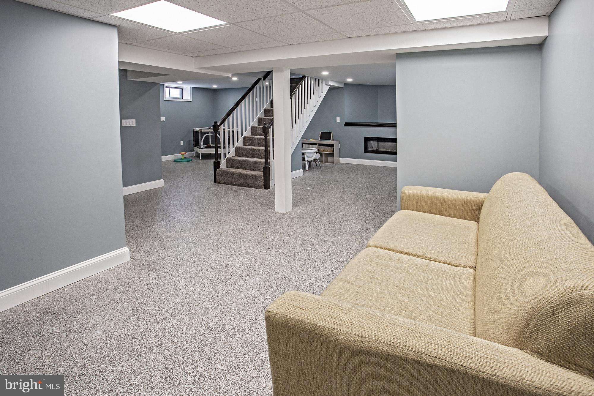 5000 Ogletown Stanton Road Newark, DE 19713 - Photo 21 of 39 a view of livingroom and stairs