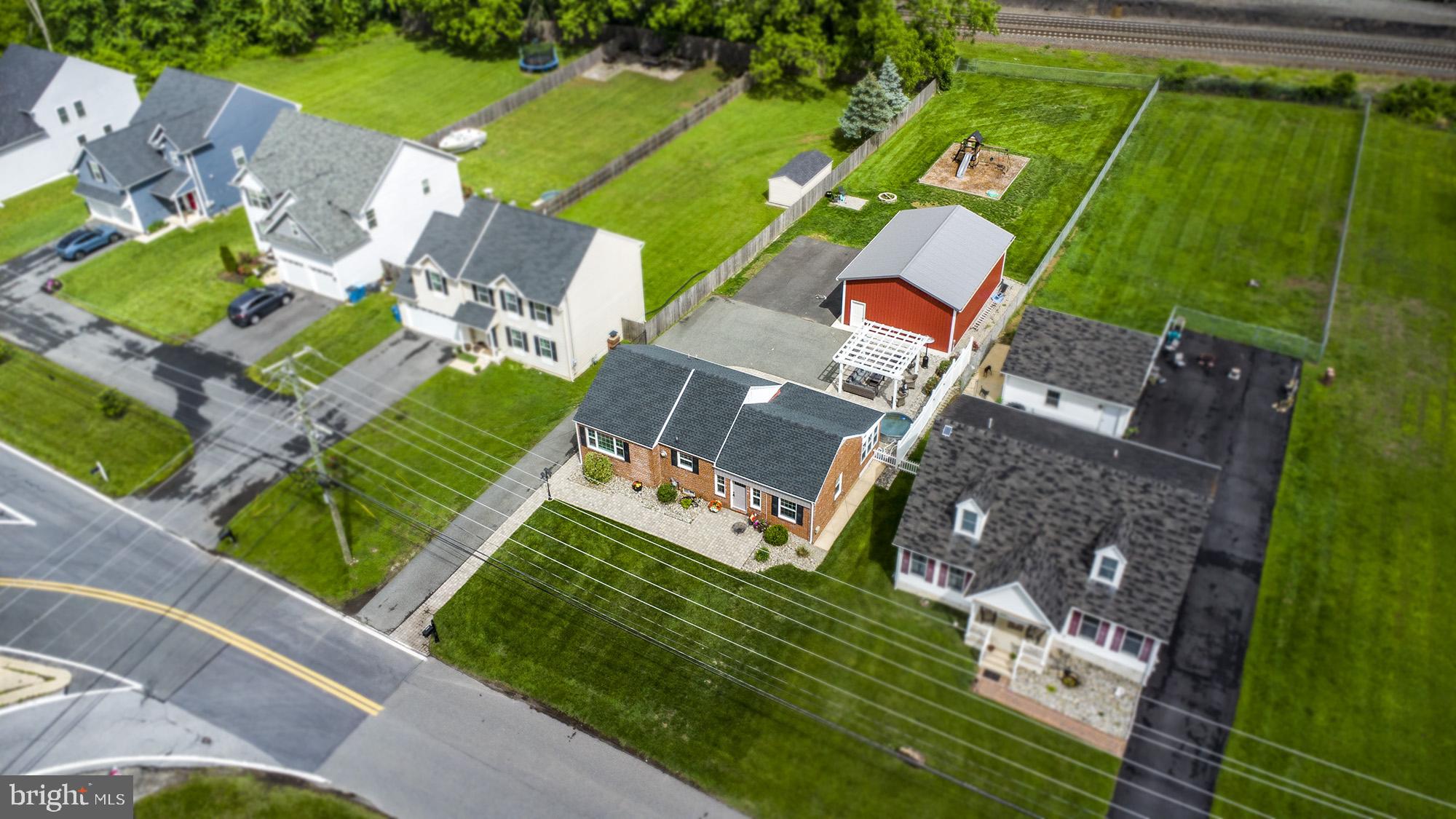 5000 Ogletown Stanton Road Newark, DE 19713 - Photo 34 of 39 an aerial view of a house with a garden and trees