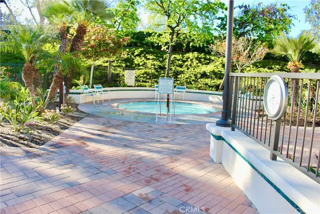 a front view of a house with swimming pool