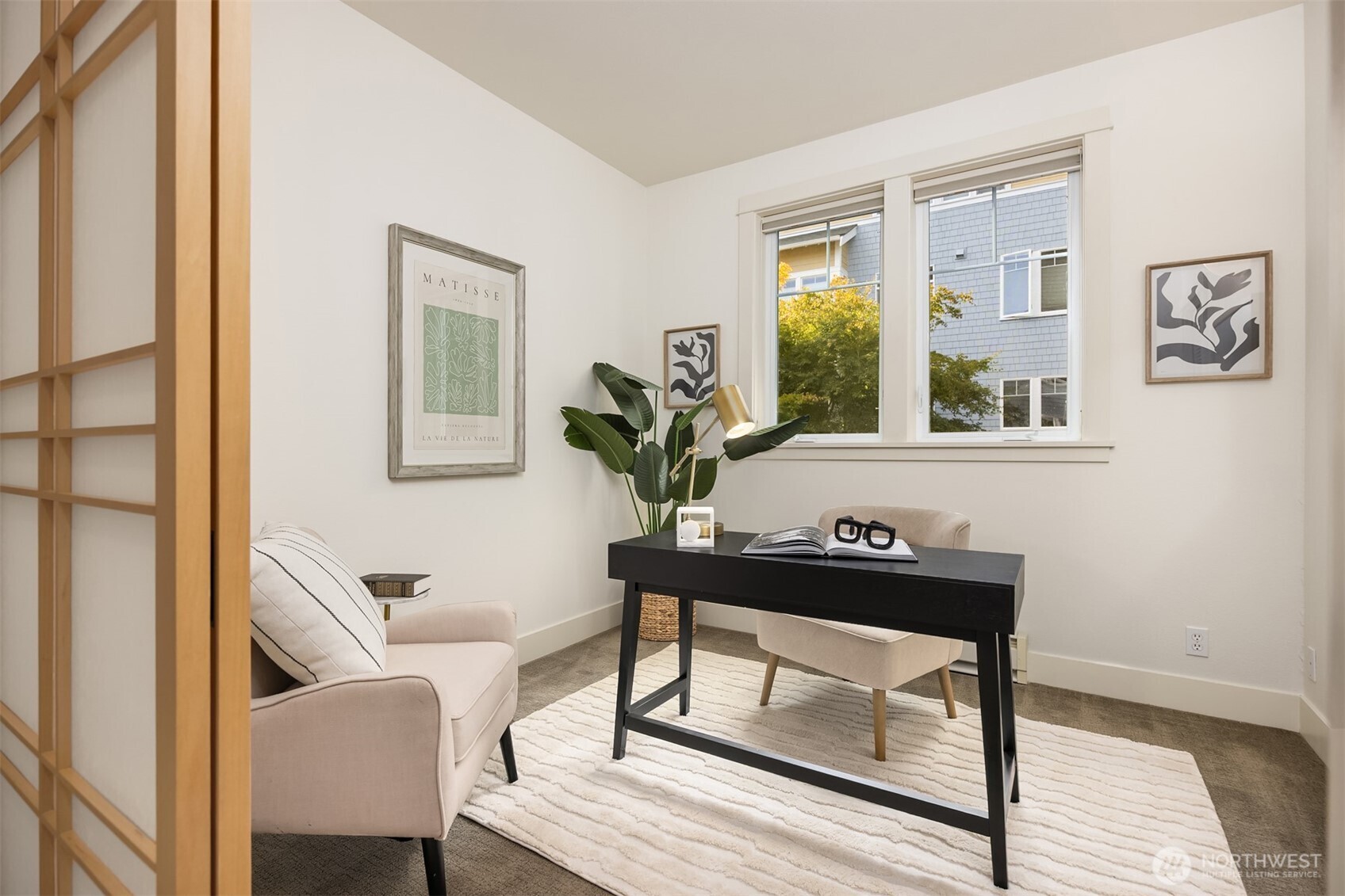 144 Hall Brothers Loop Northwest, Unit 101 Bainbridge Island, WA 98110 - Photo 20 of 30 a view of a workspace with furniture and a potted plant