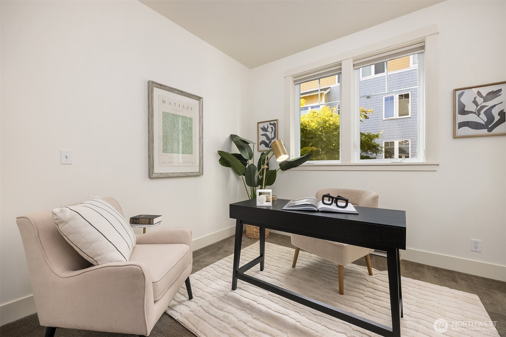 144 Hall Brothers Loop Northwest, Unit 101 Bainbridge Island, WA 98110 - Photo 21 of 30 a living room with furniture and a window