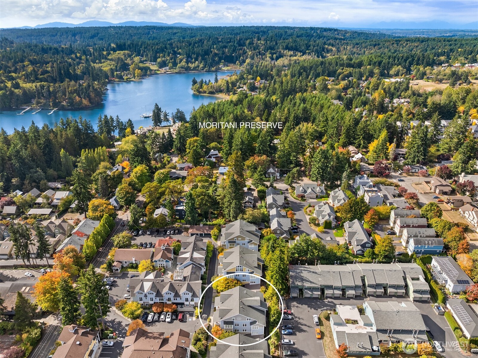 144 Hall Brothers Loop Northwest, Unit 101 Bainbridge Island, WA 98110 - Photo 25 of 30 an aerial view of a city with lots of residential buildings