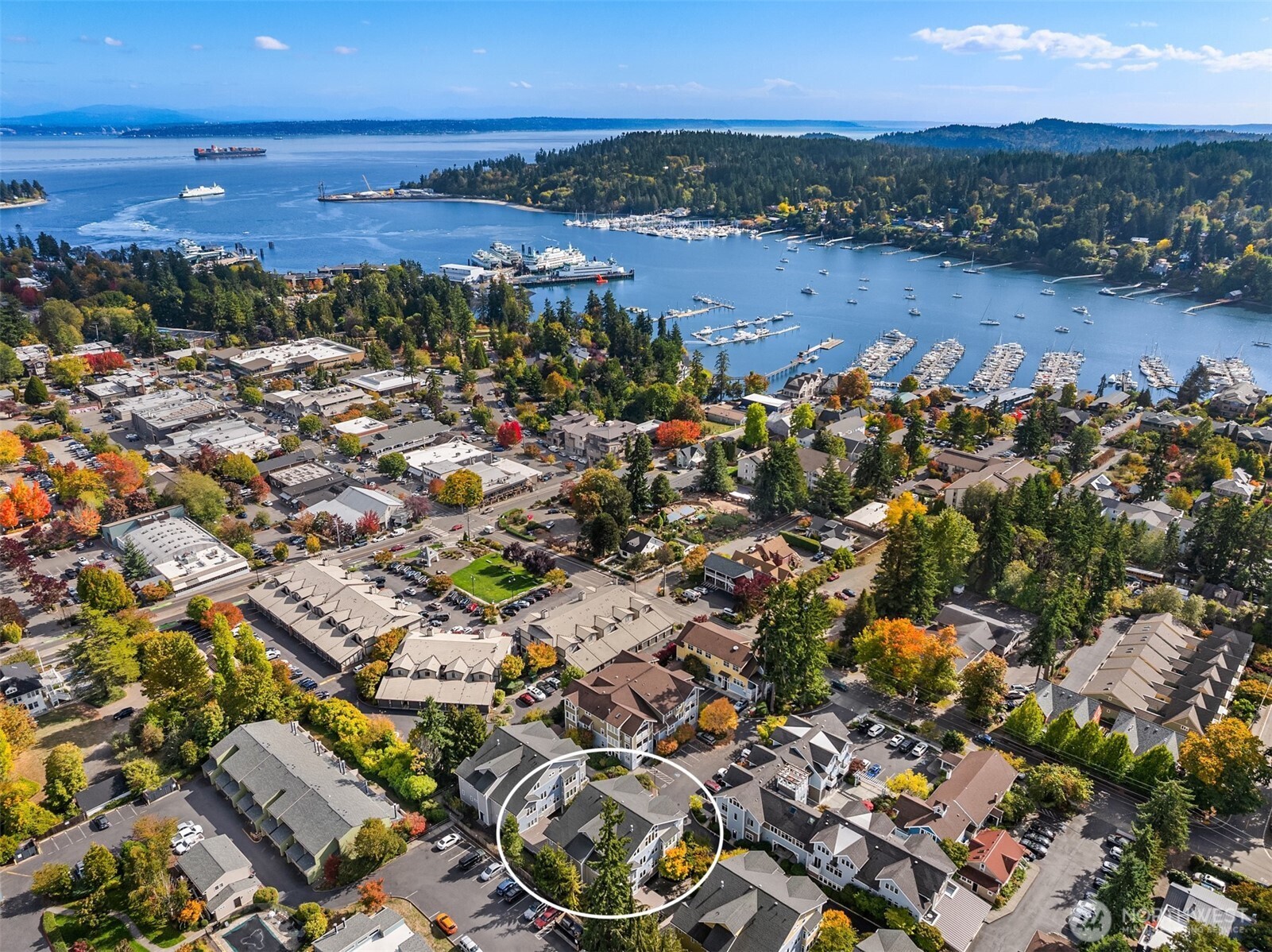 144 Hall Brothers Loop Northwest, Unit 101 Bainbridge Island, WA 98110 - Photo 3 of 30 an aerial view of a city