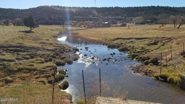a view of a lake with mountain