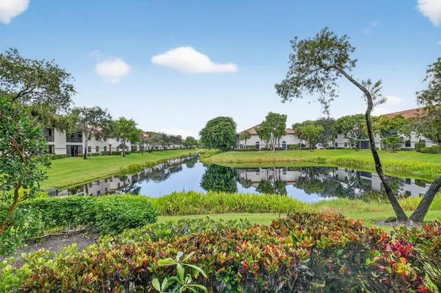 a view of a lake with a big yard